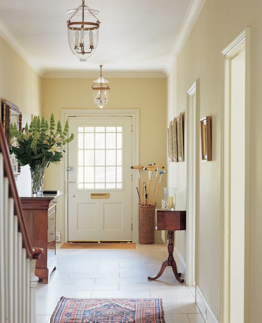 how to brighten a dark hallway - white hallway