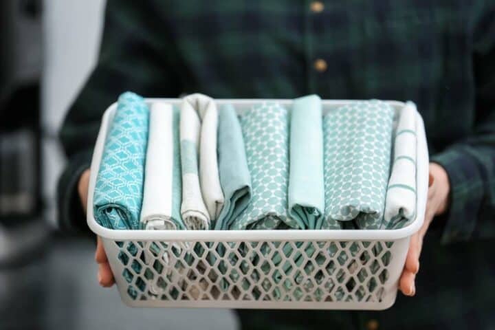 how to fold kitchen towels - folded kitchen towels in basket