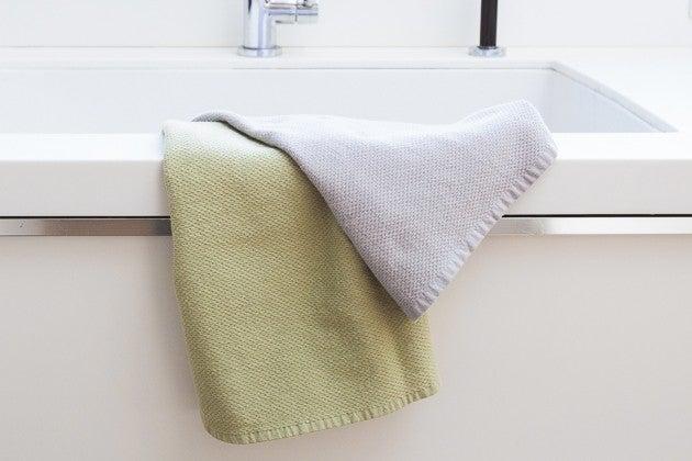 how to fold kitchen towels - folded kitchen towels in bath tub