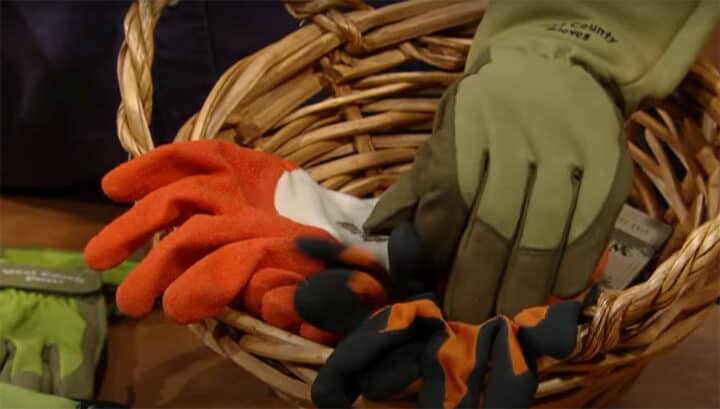 how to wash gardening gloves: garden gloves in basket