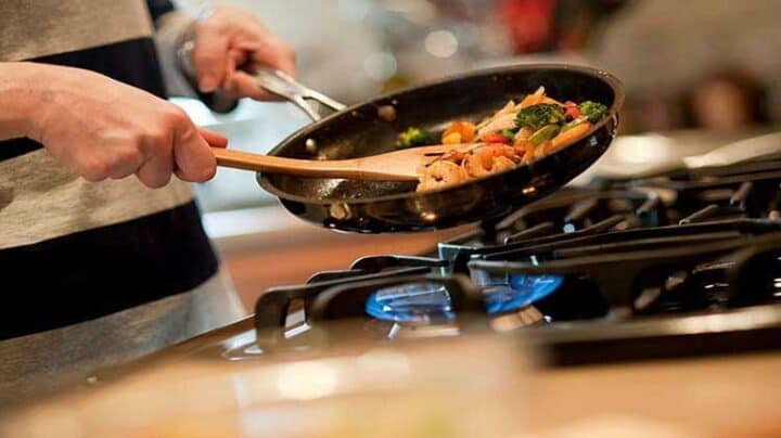 why is jewelry inappropriate to wear in the kitchen - person cooking